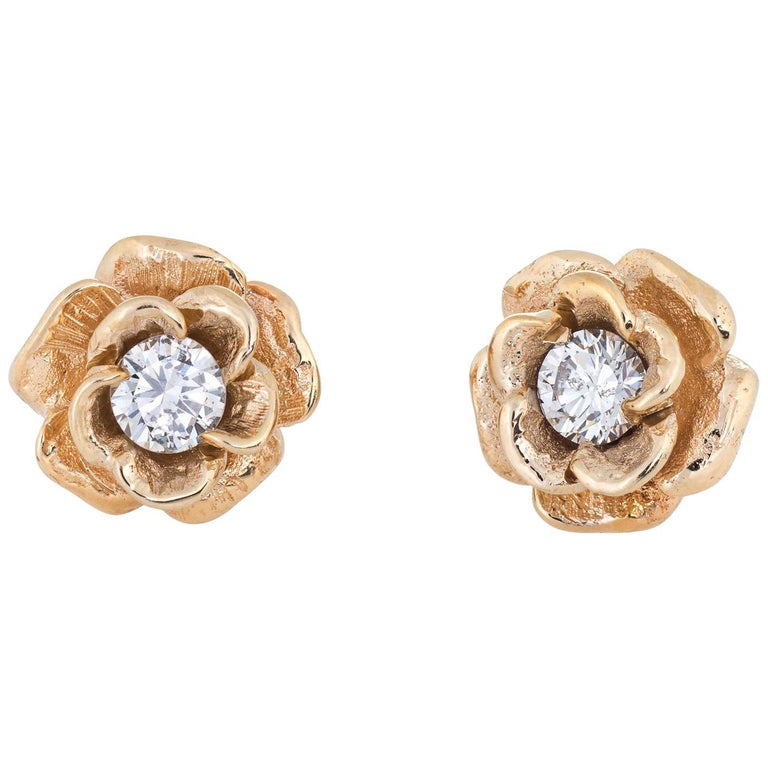 14E00036. - 14 Karat Yellow Gold Flower Red and Clear CZ Screw Back Stud Earrings