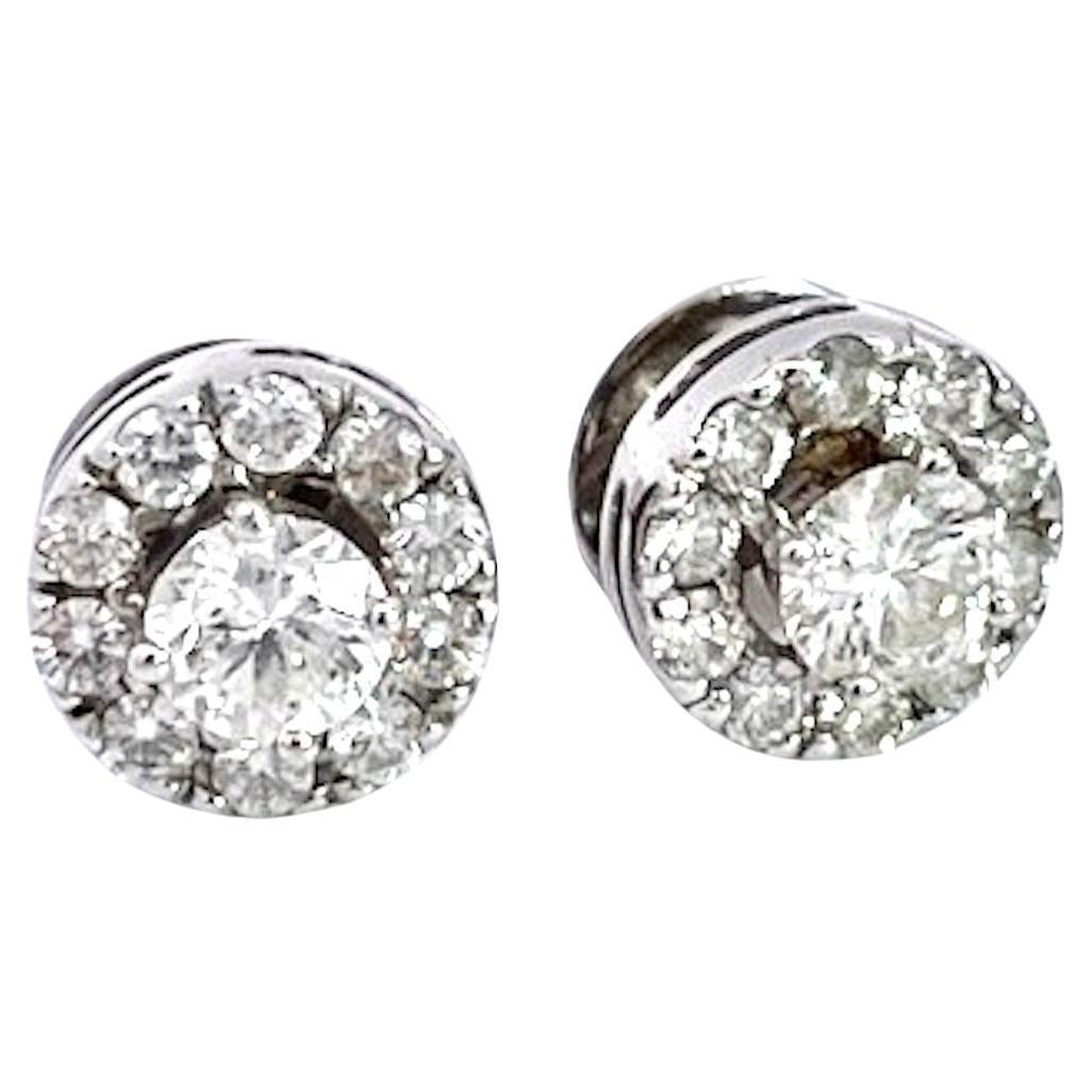 Diamond Stud Earrings with a Diamond surround 18K