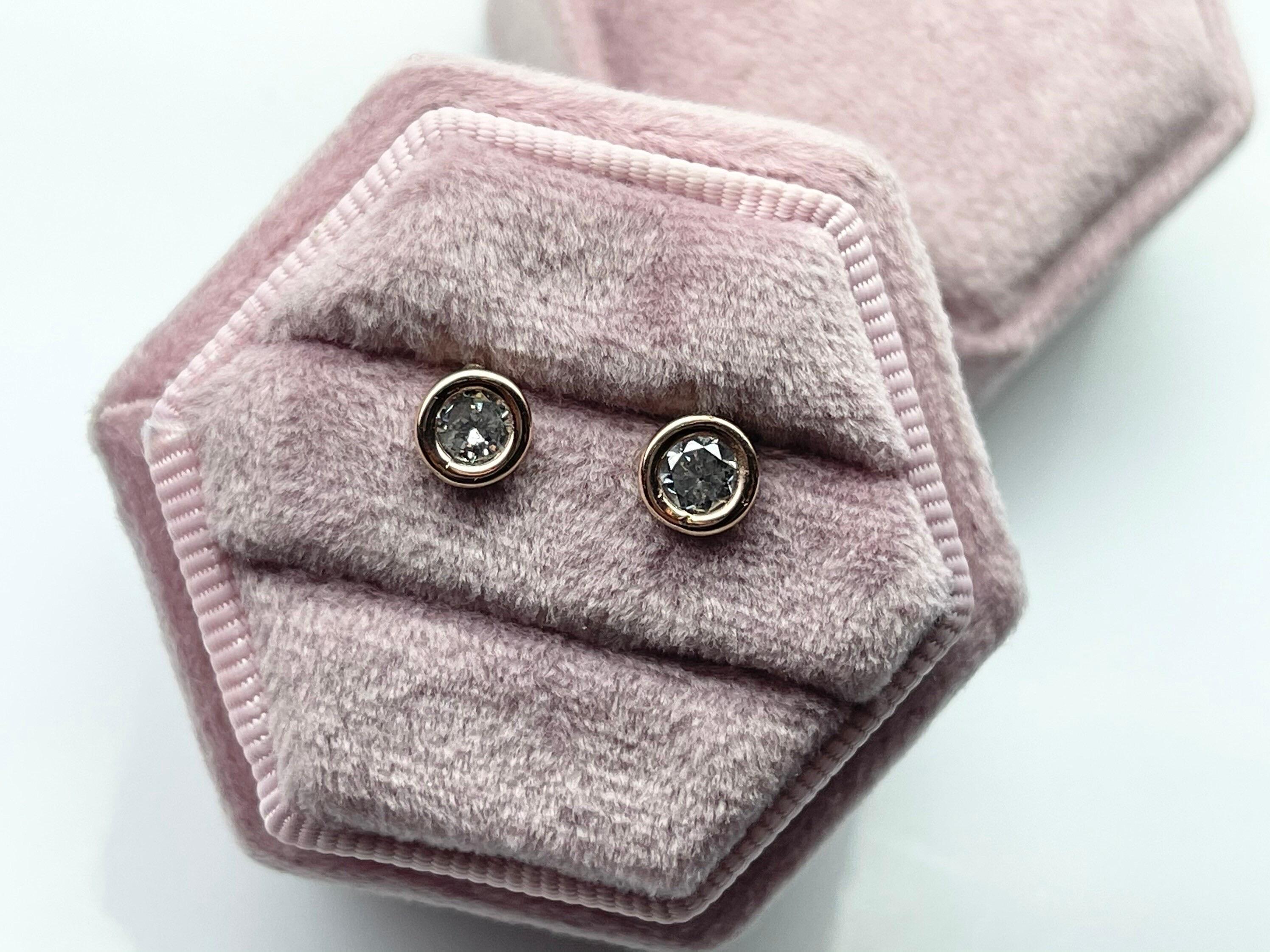 Super comfortable earring studs, made in 18KT yellow gold, the butterfly is with silicon topper over gold for extra security. The studs are 0.50 carats each for a total of 1 carat. The earrings appear to be bigger because of the bezel setting.