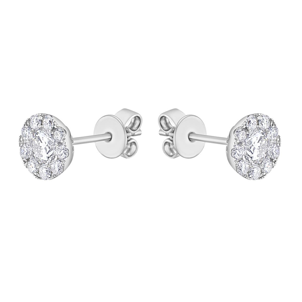 With these exquisite diamond studs, style and glamour are in the spotlight. These studs are set in 14-karat gold, made out of 1.0 grams of gold. The color of the diamonds is SI. The clarity is VS2-SI1. It is made out of 2 diamonds totaling 0.44