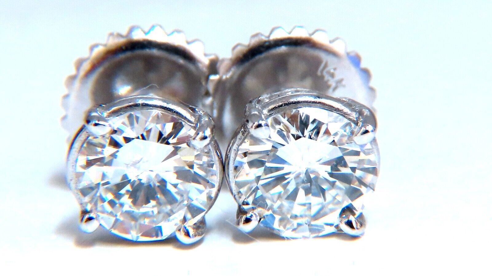 1.01 & 1.06cts of natural round diamonds stud earrings.

GIA Report ID's:

6224158404

6224158401

Stating: G-H-color & I1 clarity.

Please see the reports for the details.

 Comfortable Push-back closure.

$32,000 Appraisal Certificate to accompany