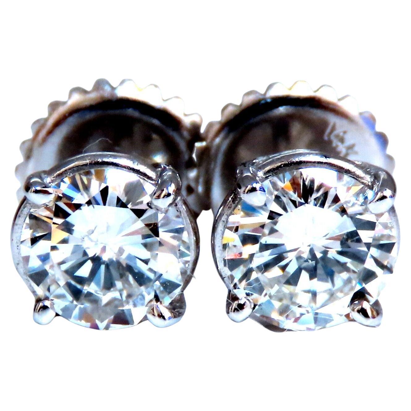 Diamond Studs GIA Certified 2.07 Carat Earrings 14 Karat For Sale