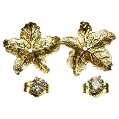Clous d'oreilles en forme de feuilles en or jaune 14 carats avec diamants, avec évaluation