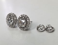 Diamond Studs with Jackets Color "F", Clarity SI3 and Weight 3.03 Carat
