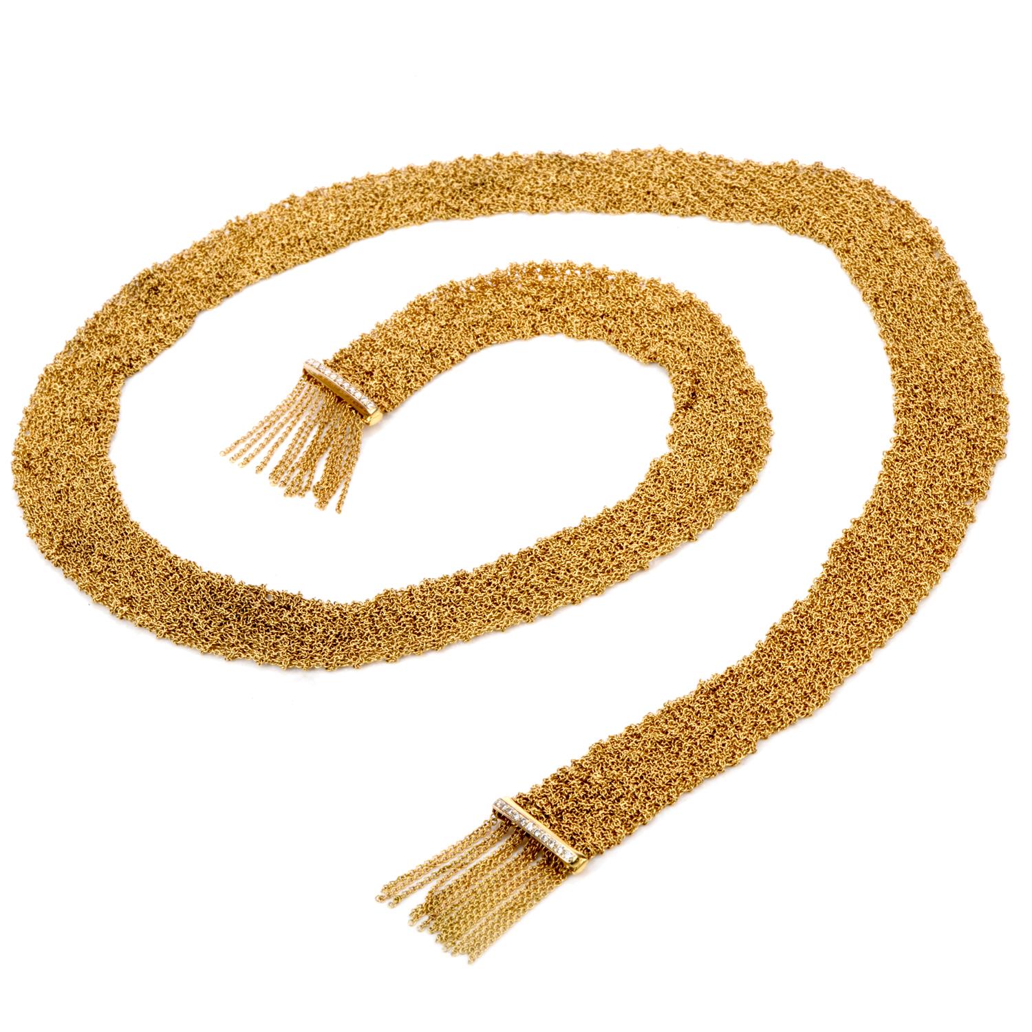 This Estate Necklace was inspired with a Scarf Style mesh Necklace Wrap around neck

motif and crafted in 18K. This long mesh chains run the full 27 inches of length and width of 19mm.

 Adorning each end is a Gold bar containing 11 round diamonds. 