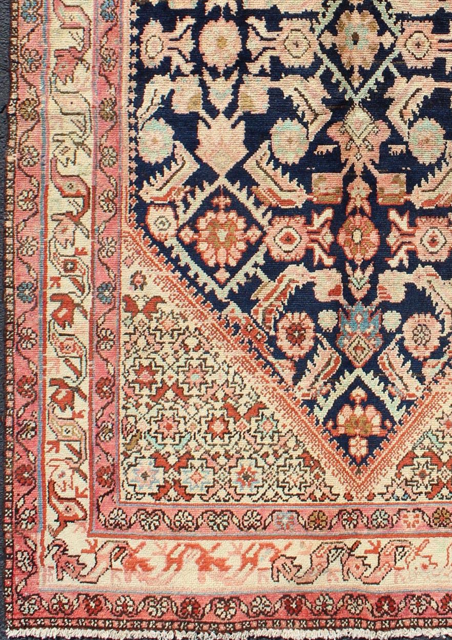 Diamond sub-geometric medallion antique Malayer Persian rug with floral borders, rug h-711-26, county of origin / type: Iran / Malayer, circa 1940

This mid-20th century antique Persian Serab carpet features a tan-colored field decorated with a