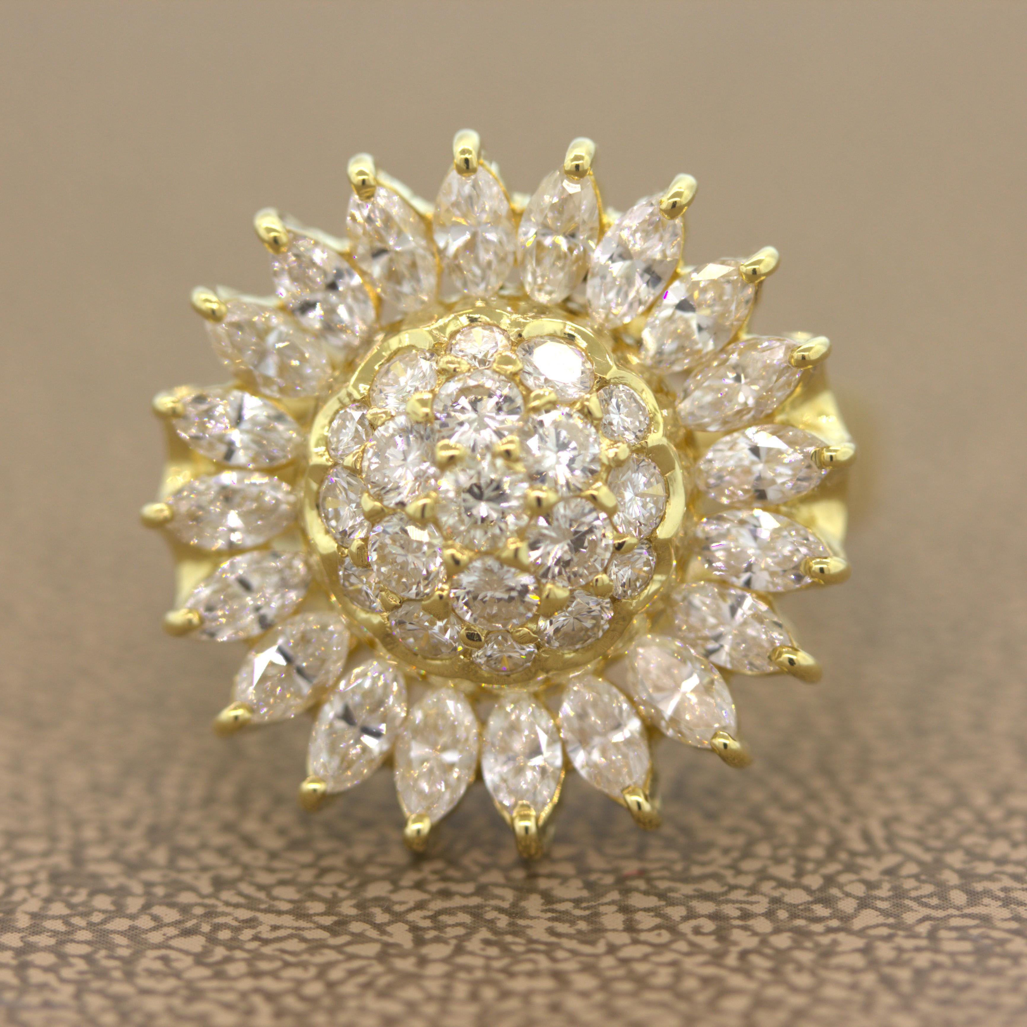 A lovely sunflower adorned by 2.88 carats of fine bright white diamonds. They include round brilliant-cuts in the center portion of the sunflower and marquise shapes on the outer circle creating the sunflower style. Made in 18k yellow gold and ready