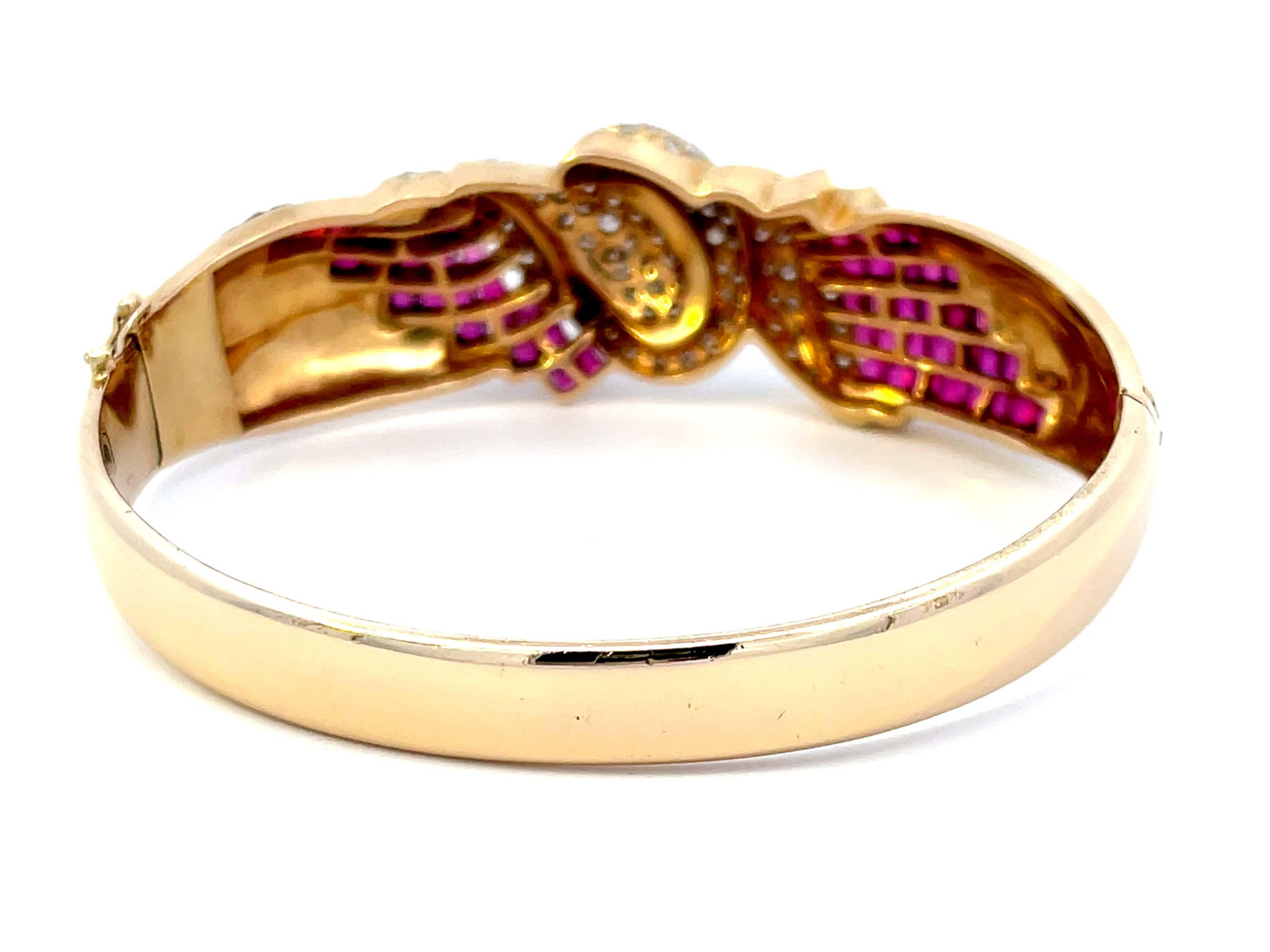 Diamond Swan and Ruby Bangle in 14k Yellow Gold In Excellent Condition For Sale In Honolulu, HI