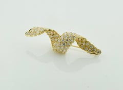 Diamond Swirl Brooch in 18 Karat Yellow Gold 2.05 Carat, circa 1960s