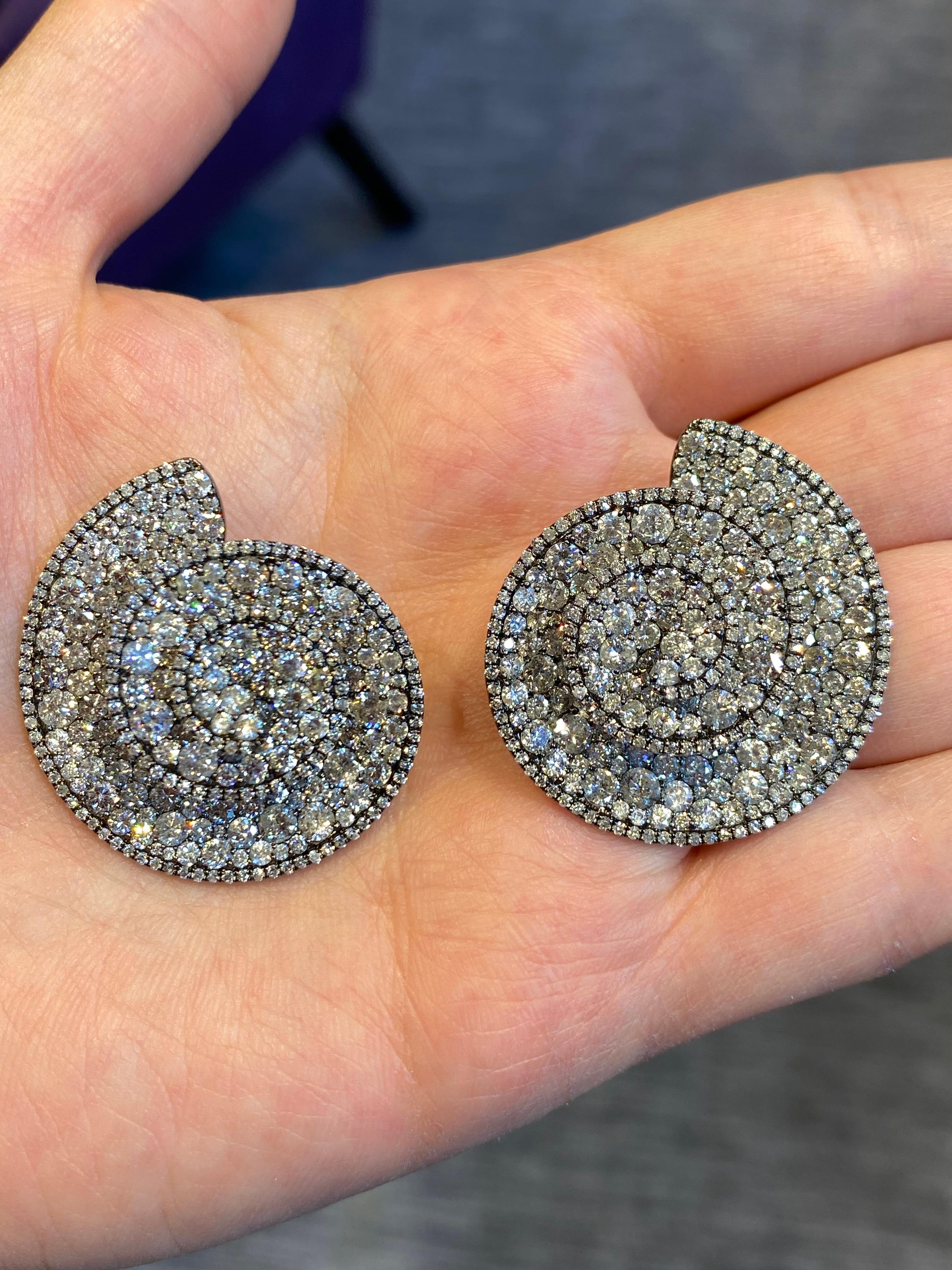 Diamond Swirl Earrings
Diamond Weight: Approximately 15.31 Cts 
Back Type: Push Back 
Measurements: 1.25