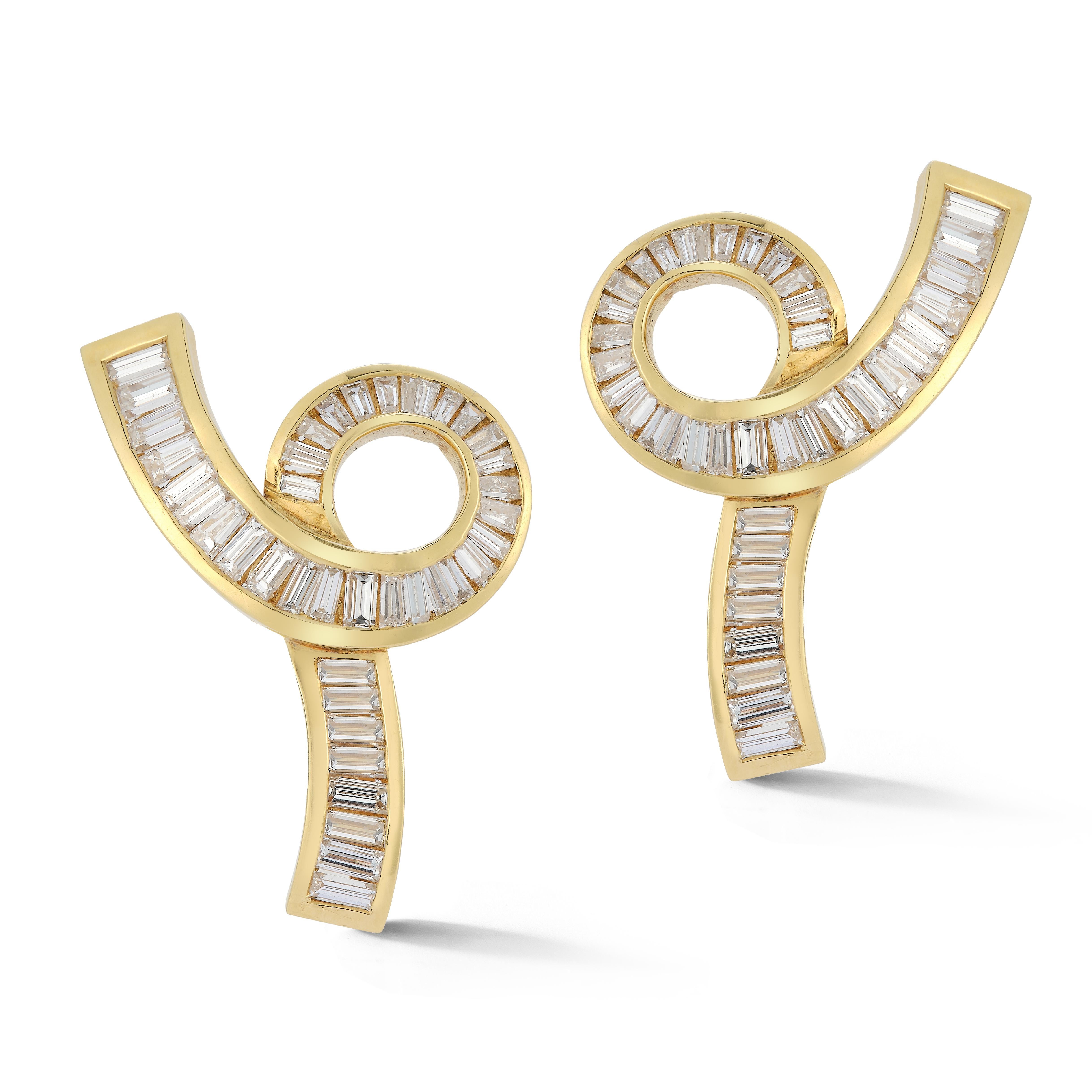 Diamond Swirl Earrings

 18 karat yellow gold swirl clip on earrings with 80 baguette diamonds with a total approximate weight of 6.90ct
