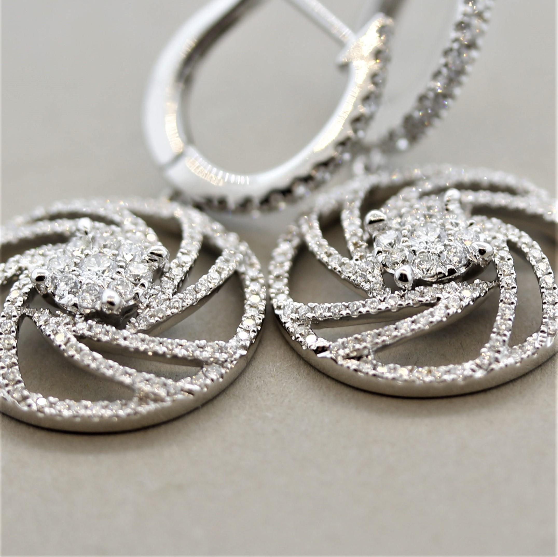 Round Cut Diamond Swirl Gold Drop Earrings For Sale