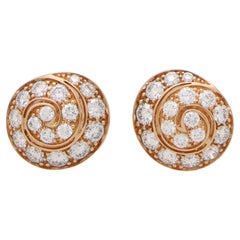 Boucles d'oreilles en or rose 18k avec tourbillon de diamants