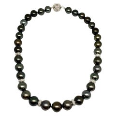 Collier en or 18k avec diamant et perle de Tahiti Certifié