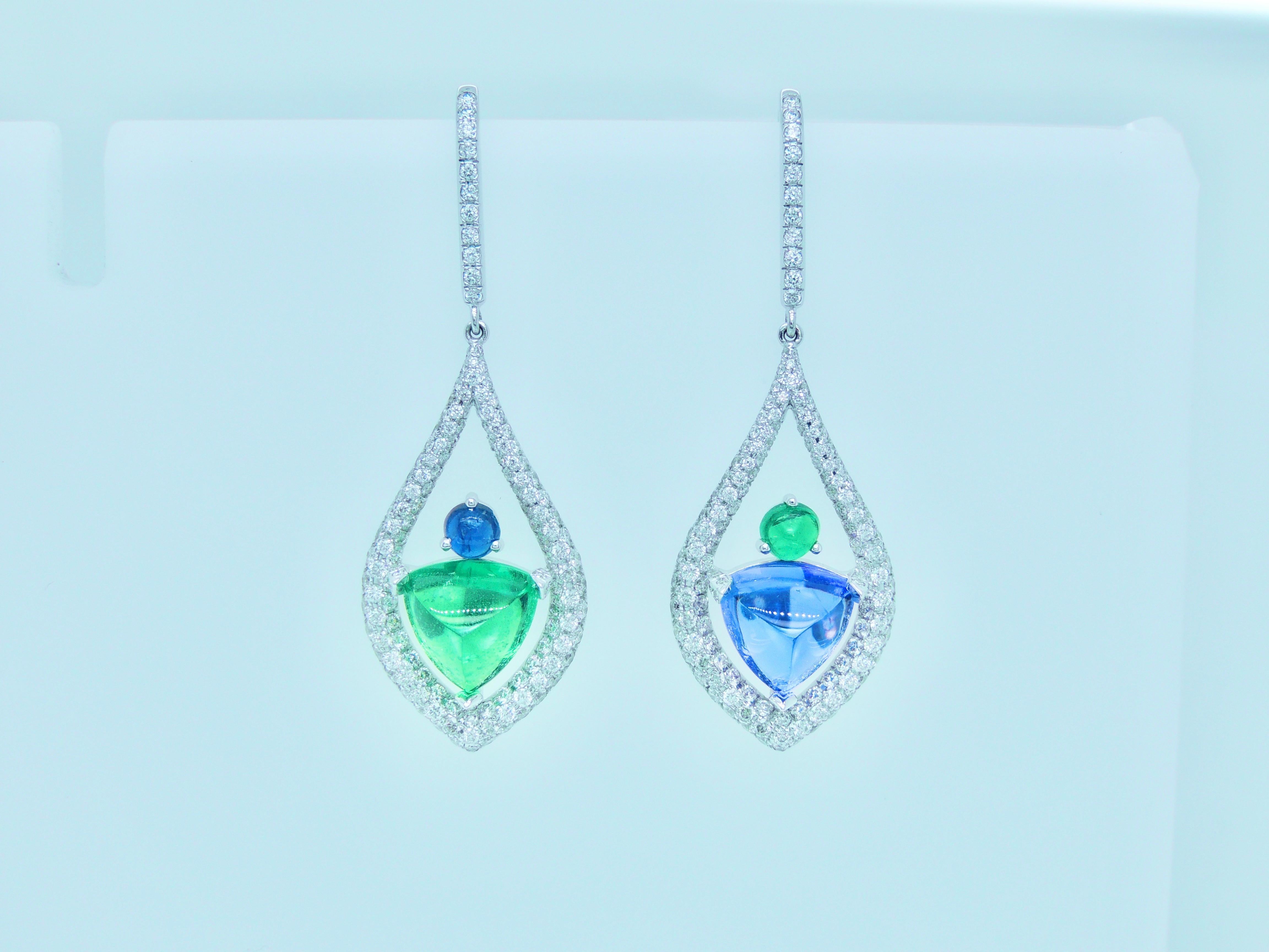 Beautiful mismatch drop earrings with triangular tsavorite and tanzanite cabochons, round emerald and sapphire cabochons and diamond micropavé.

•	Total Diamond Weight: 1.19 carats
•	Tsavorite Weight: 2.64 carats
•	Tanzanite Weight: 2.34