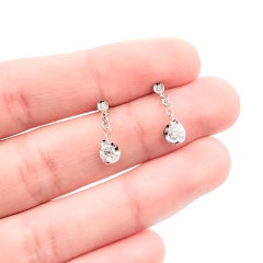 Boucles d'oreilles en forme de larme serties de diamants, en or blanc 18 carats