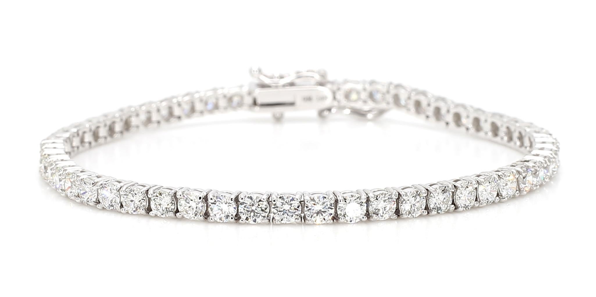This exquisite 5.6 Carat Diamond Tennis Bracelet is a masterpiece of elegance and sophistication. Featuring a series of round-cut diamonds, each stone is meticulously selected for its white color and brilliance. The diamonds, with a clarity of VS2