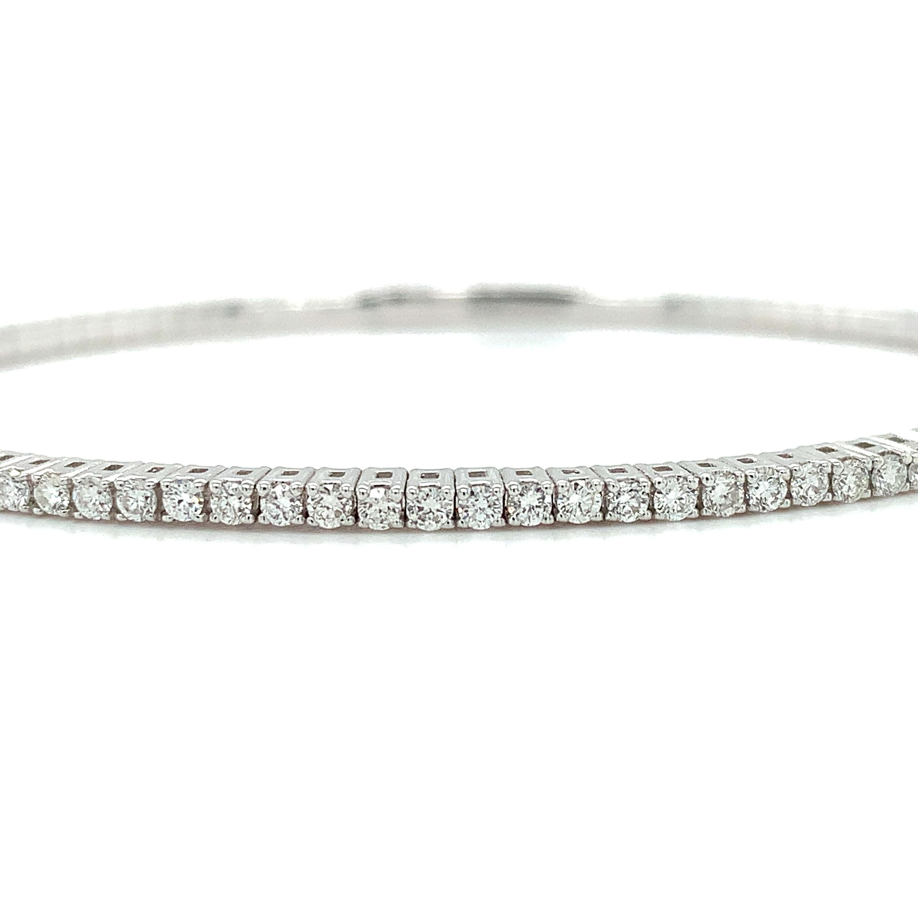 Modern Diamond tennis bangle bracelet 18ct white gold For Sale