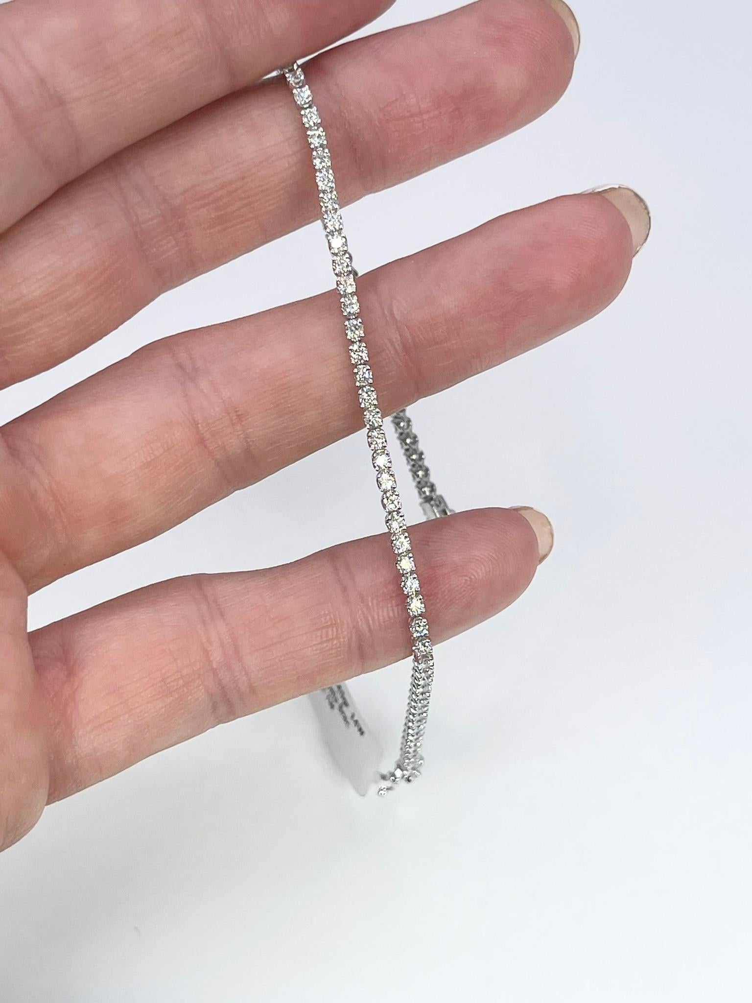 Diamond Tennis bracelet made in 14KT white gold.

GRAM WEIGHT: 4.16gr
METAL: 14KT white gold

NATURAL DIAMOND(S)
Cut: Round Brilliant
Color: F-G 
Clarity: VS-SI 
Carat: 0.95ct
Length: 7