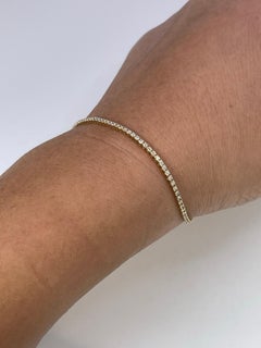 Bracciale tennis con diamanti in oro giallo 14KT 0,95ct