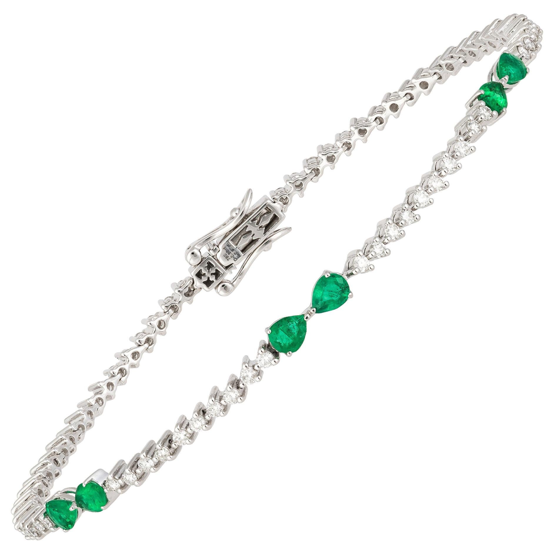 Bracelet tennis en or 18 carats avec diamants 0,98 carat/72 pièces émeraudes 0,68 carat