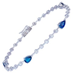 Bracelet tennis en or blanc 18 carats avec diamants et saphir bleu de 2,14 carats (4 pièces)