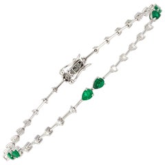 Bracciale tennis con diamanti in oro bianco 18 carati Diamante 0,42 carati/30 carati Smeraldo 0,86 carati