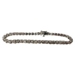 Bracciale tennis con diamanti 4,50ct in oro bianco 14KT