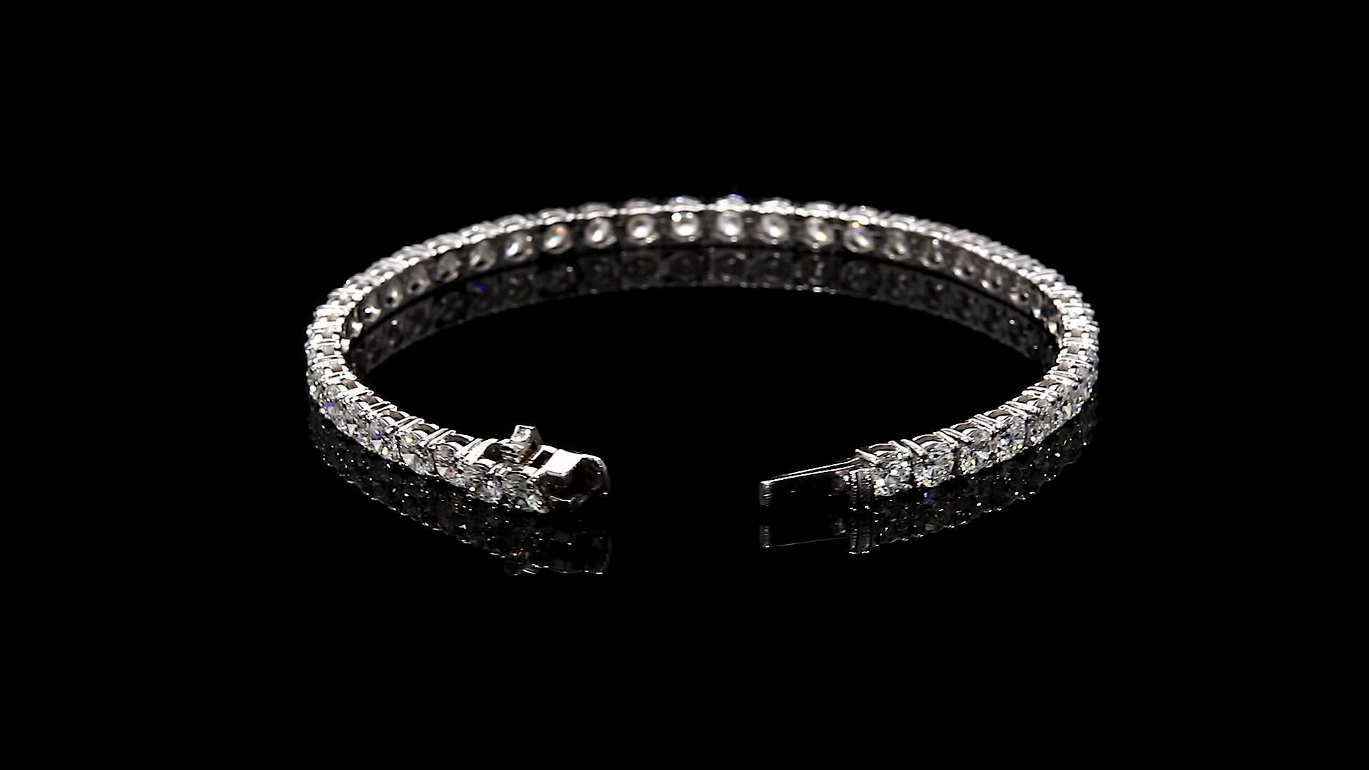 Diamond Tennis Bracelet 5.01 Total Carat Weight 18K White Gold

With Round Diamonds, 0.08 Carats Each 

Diamonds are DEF in Color and VS2 in Clarity

Total Carat Weight is 5.01 Carats 

4-Prong Setting

Length: 7.0 inches

Set in 18 Karat White