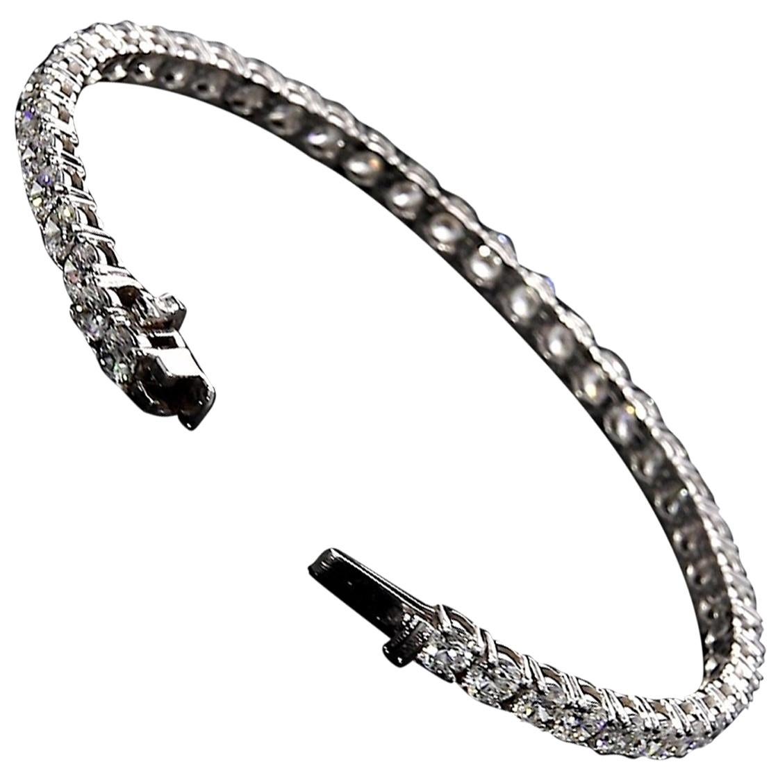 Diamond Tennis Bracelet 4.93 Carat DEF Color VS2 18 Karat White Gold For Sale