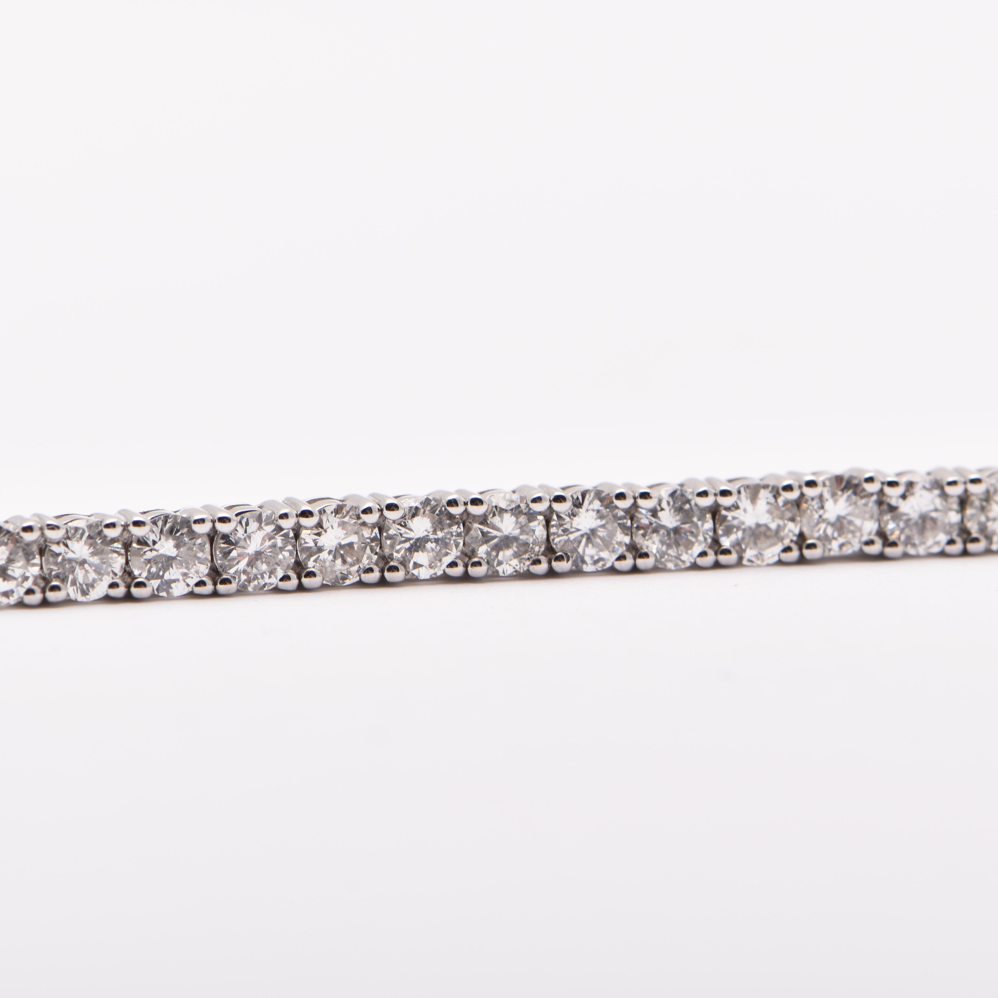 Diamond tennis bracelet; featuring 59 round brilliant cut diamonds totalling 5.21 Carats, set in 18ct White Gold (total 10.26 grams)   

FREE express postage usually 3-4 days Sydney to New York  
FREE international insurance 
by Cartmer Jewellery,