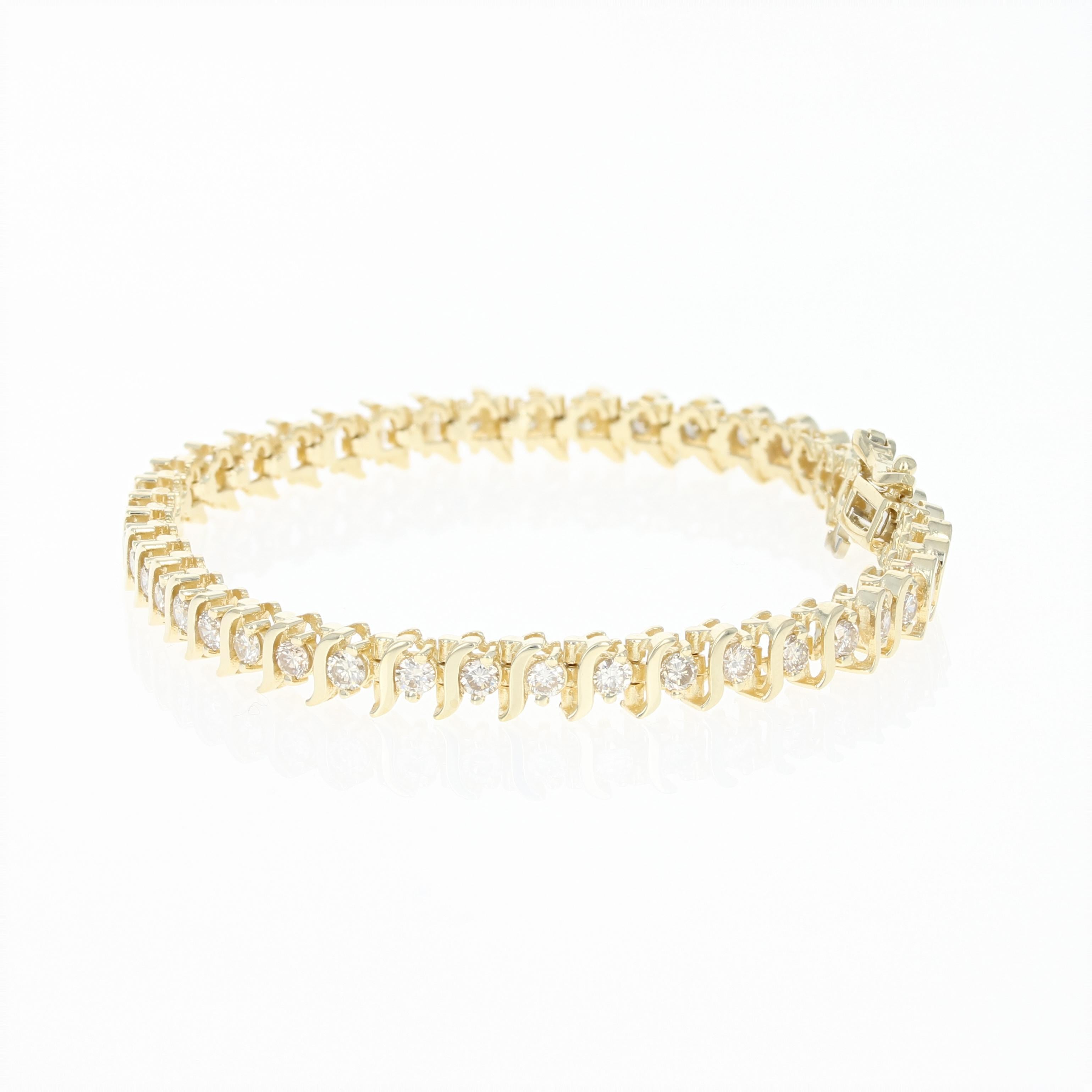 Get ready to light up the night wearing this radiant piece! Fashioned in a classic tennis style, this sophisticated 14k yellow gold bracelet showcases a sparkling array of white diamonds held in ported mounts to illuminate their inner brilliance