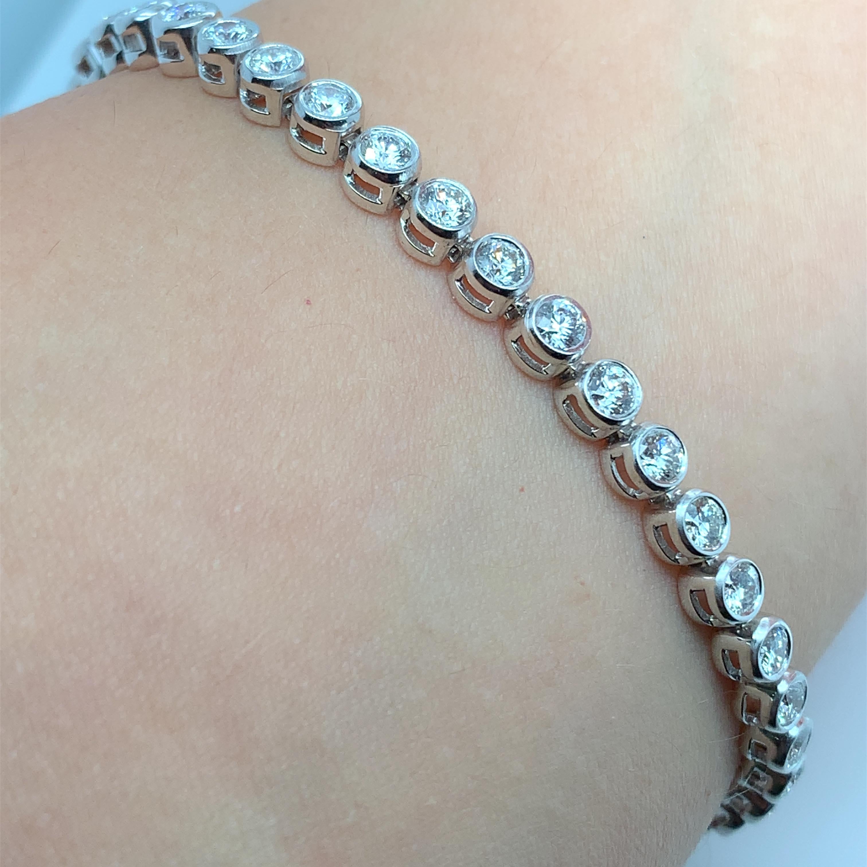 Modern Diamond tennis bracelet bezel rubover 18k white gold For Sale