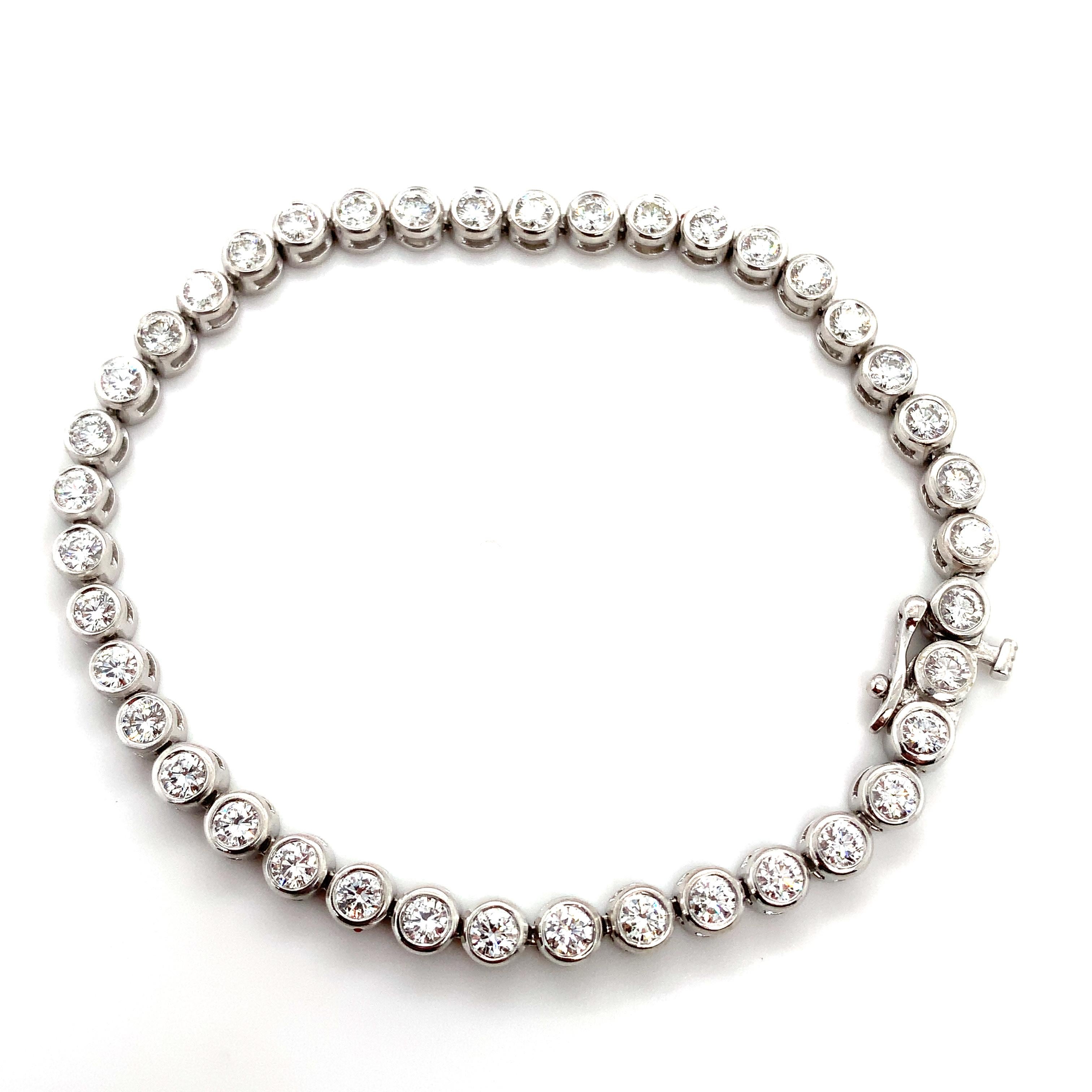 Women's or Men's Diamond tennis bracelet bezel rubover 18k white gold For Sale