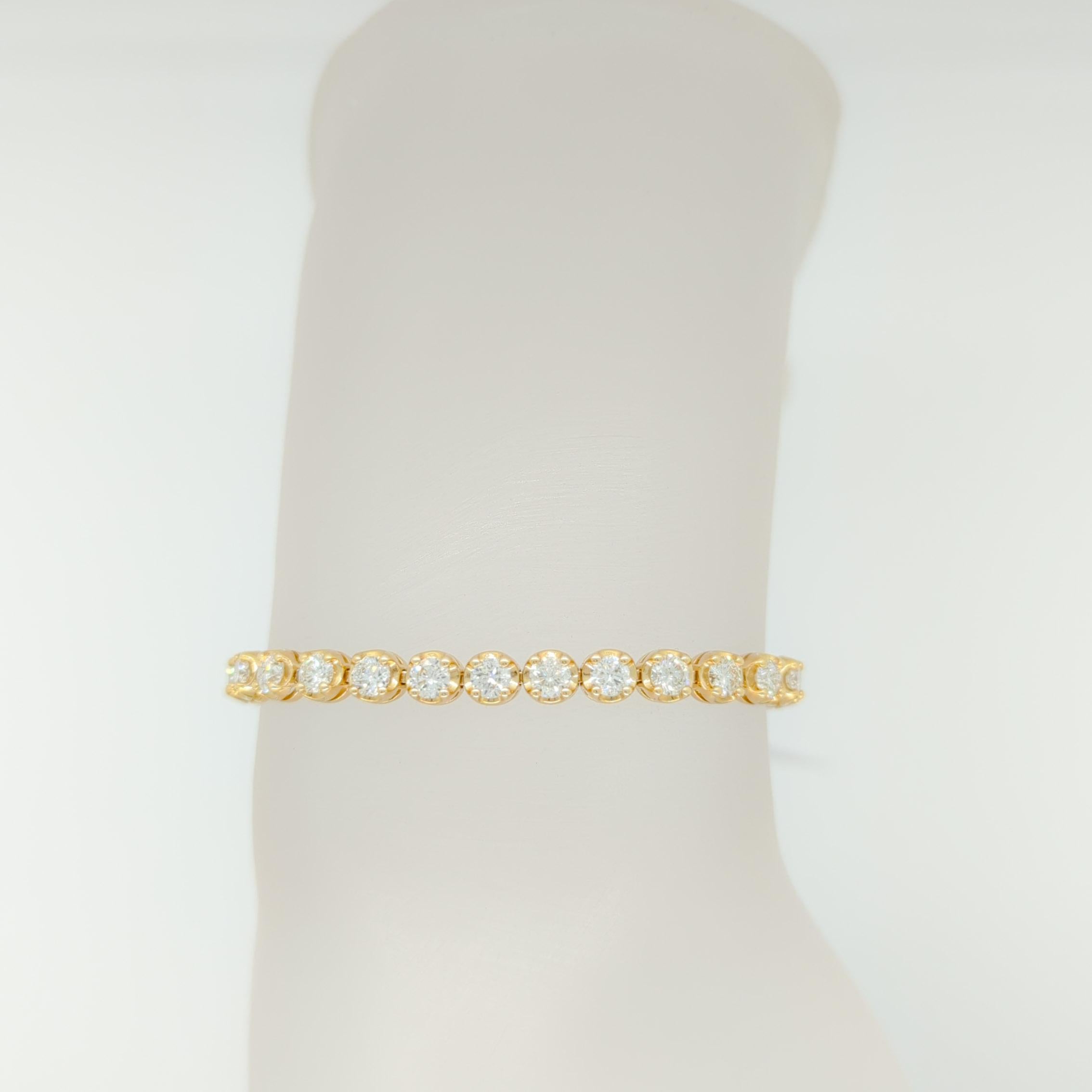 Beautiful 5.10 ct. good quality white diamond rounds, total of 37 stones.  Handmade in 14k yellow gold.  4 prong setting.  Length is 7