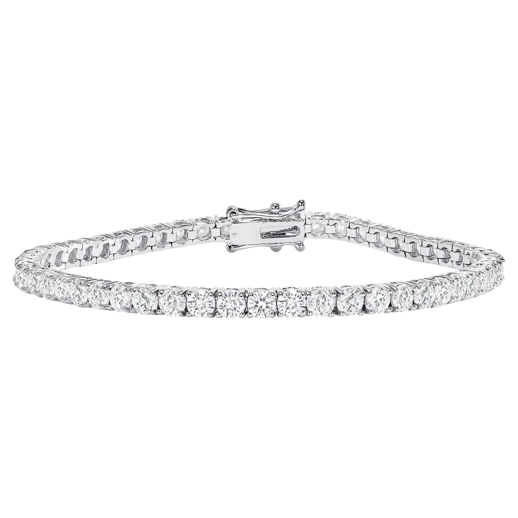 This diamond tennis bracelet features beautifully cut natural earth mined round diamonds set gorgeously in 14k gold.

Bracelet Information
Metal : 14k Gold
Diamond Cut : Round Natural Diamond
Total Diamond Carats : 2ttcw
Diamond Clarity : VS
Diamond