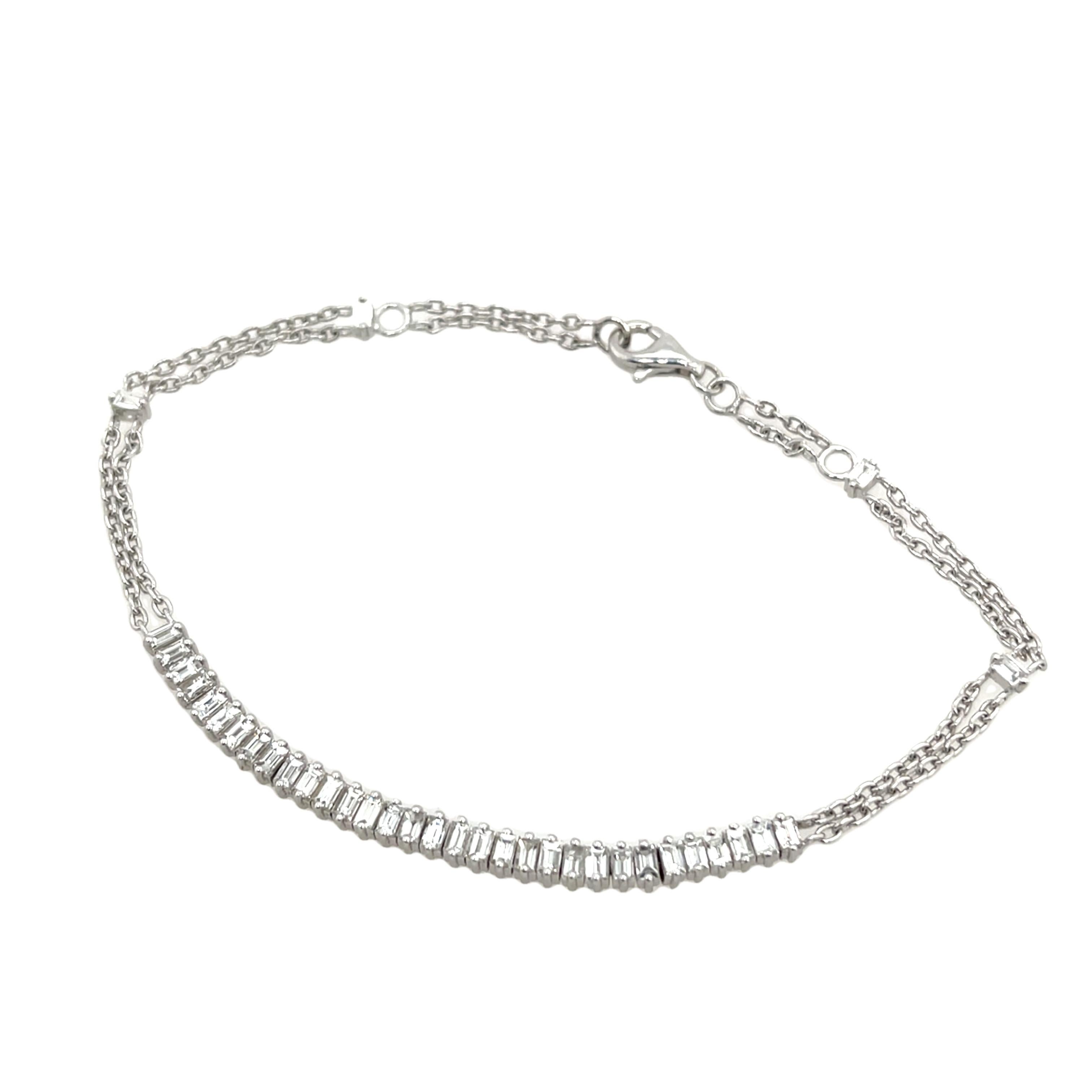An elegant bracelet crafted in 18ct gold, set with 1.0ct of baguette-cut natural diamonds. The diamonds are expertly arranged in a line, creating a seamless and timeless design. Perfect for adding a touch of luxury to any outfit.


Total weight: