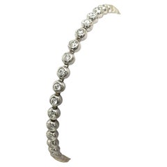 Pulsera de tenis de diamantes engastada con diamantes naturales de 1,26 ct en oro blanco de 18 ct