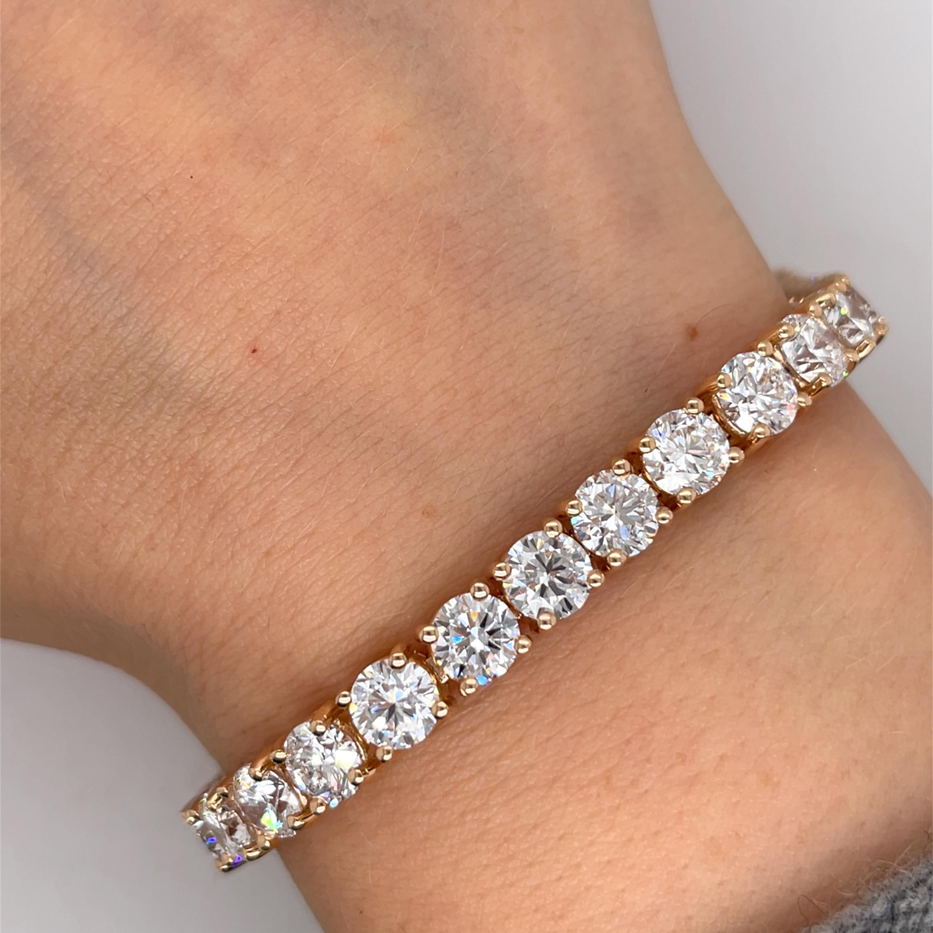 A beautiful diamond tennis bracelet in 14ct rose gold, 
features a total diamond weight of 21.17ct Lab created cut diamonds VS1 clarity G colour in a bezel setting.This is a fantastic piece of jewellery that will last a lifetime.
otal weight: