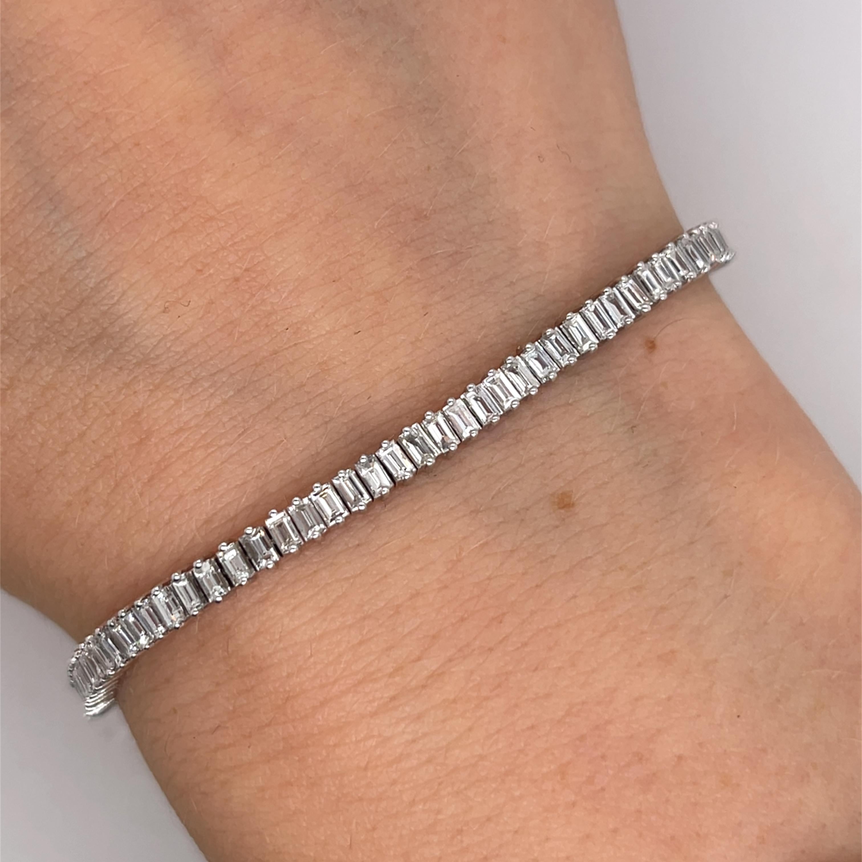 A sophisticated tennis bracelet crafted in 18ct white gold, featuring 3.50ct of baguette-cut natural diamonds. The sleek design and exquisite diamonds 
make it a timeless and elegant piece for any occasion.


Total weight: 9.57g
Total Diamond