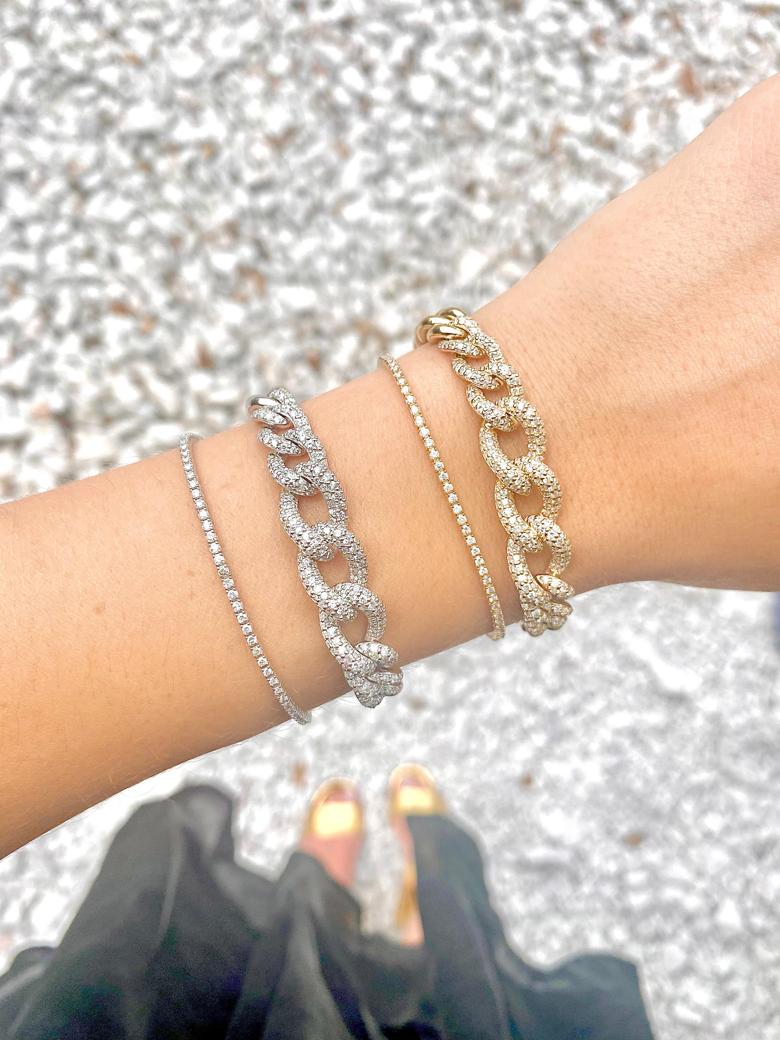 With a string of diamonds, this bracelet is stunning by itself or shared with a bracelet party! With a full carat of diamonds, this bracelet can be ordered in 14 karat white or yellow gold.  Shown in the image in white gold, the diamonds are bright
