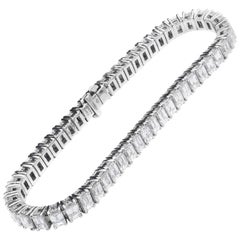 Bracciale tennis con diamanti e tagli smeraldo
