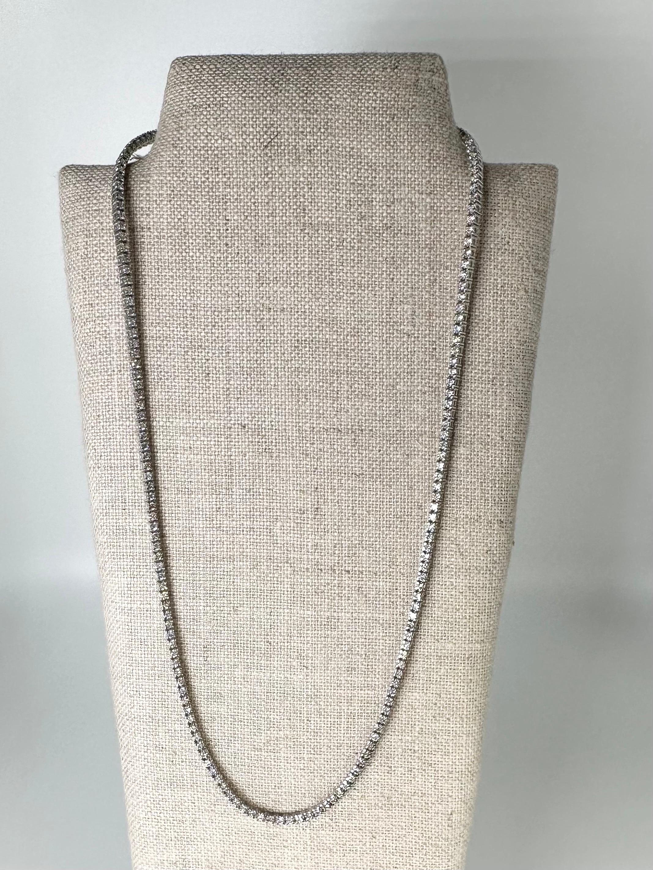 Classy tennis necklace with 3.51 carats of natural diamonds in 14KT white gold, this necklace is 16 inches! We absolutely love this necklace for how it sits on the neck, comfortable with the right amoung of luxury! Tennis necklaces this size go with