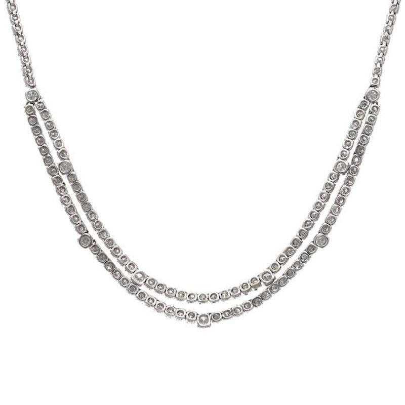 A diamond tennis necklace in 18k white gold. It has ca. 13 carat of diamonds of very good quality (G/H/F colour and VVS/VS clarity). The length of the necklace is 41cm. It is stamped 750 for 18k white gold.
