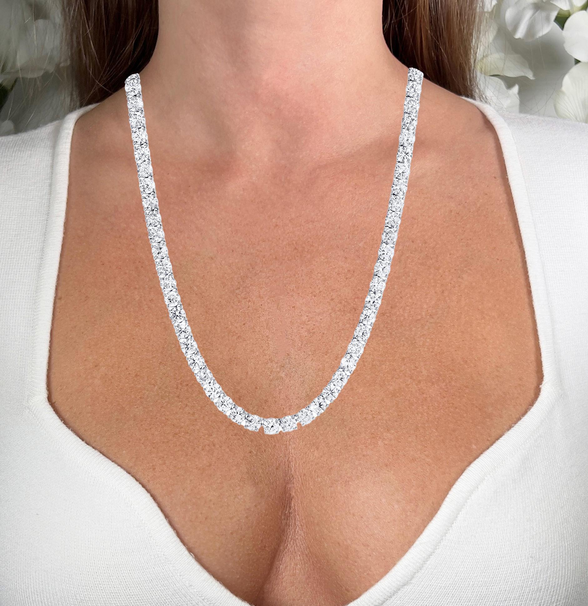 It comes with the Gemological Appraisal by GIA GG/AJP
All Gemstones are Natural
106 Diamonds = 30.70 Carats
Metal: 18K White Gold
Necklace Length: 18.5 Inches