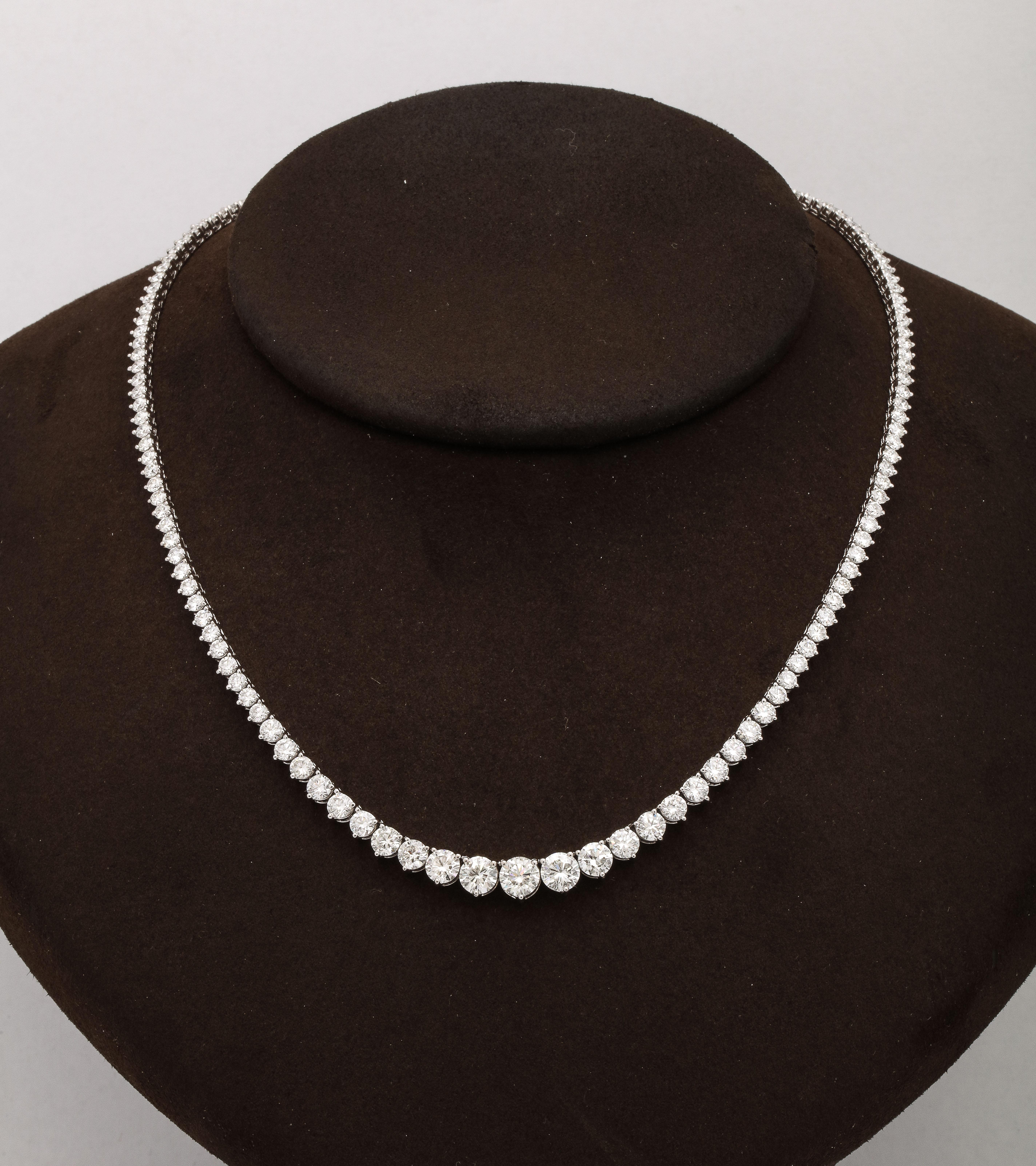 
Beautiful Diamond Riviere graduated tennis necklace. 

14.15 carats of white FG color VS clarity diamonds set in 18k white gold. 

The diamonds are vibrant and full of sparkle, they are set in a 3 prong style mounting. 

16 inch length. 


