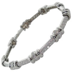 Bracelet style tennis avec diamants en or blanc 14 carats