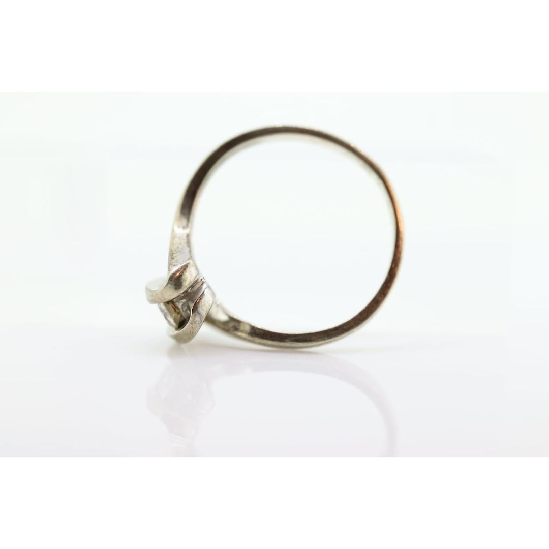Women's Diamond Tension Ring. 10k White Gold Diamond Bypass Double diamond Swirl Swivel For Sale