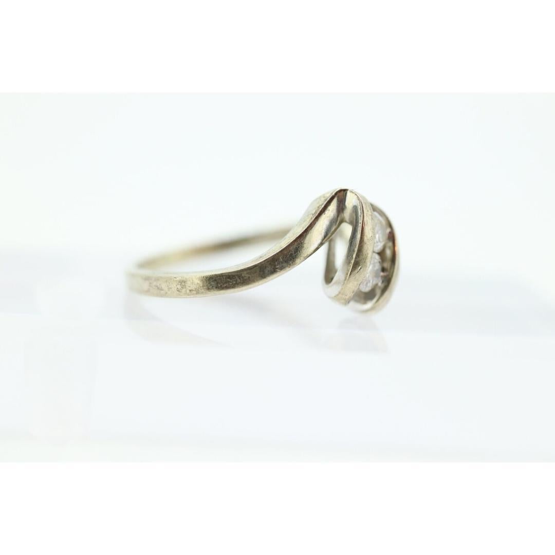 Diamond Tension Ring. 10k White Gold Diamond Bypass Double diamond Swirl Swivel For Sale 2