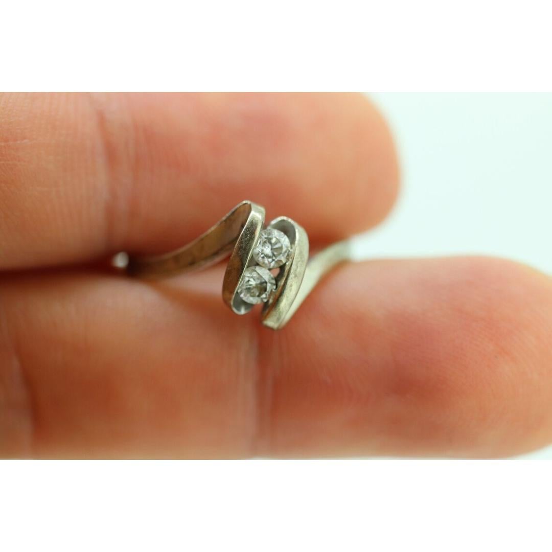 Diamond Tension Ring. 10k White Gold Diamond Bypass Double diamond Swirl Swivel For Sale 3